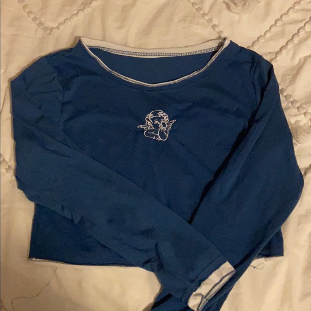 Blue cropped long sleeve with an angel💙
